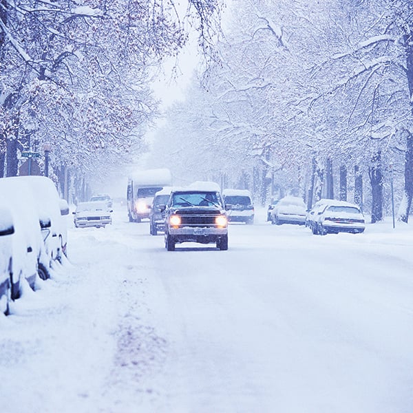 car on snowy road 