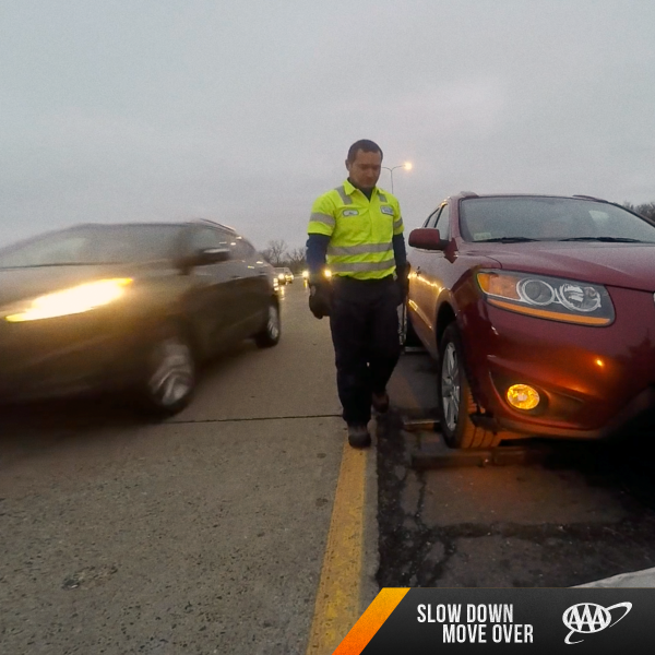 fleet tech on road car driving fast as he works