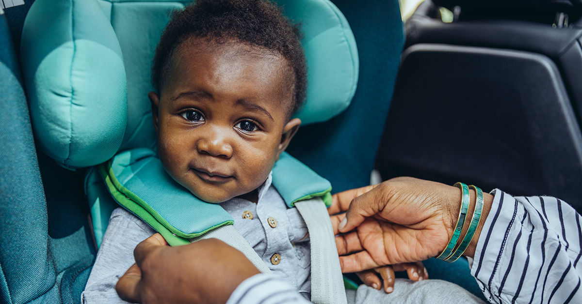 Child buckled into car seat