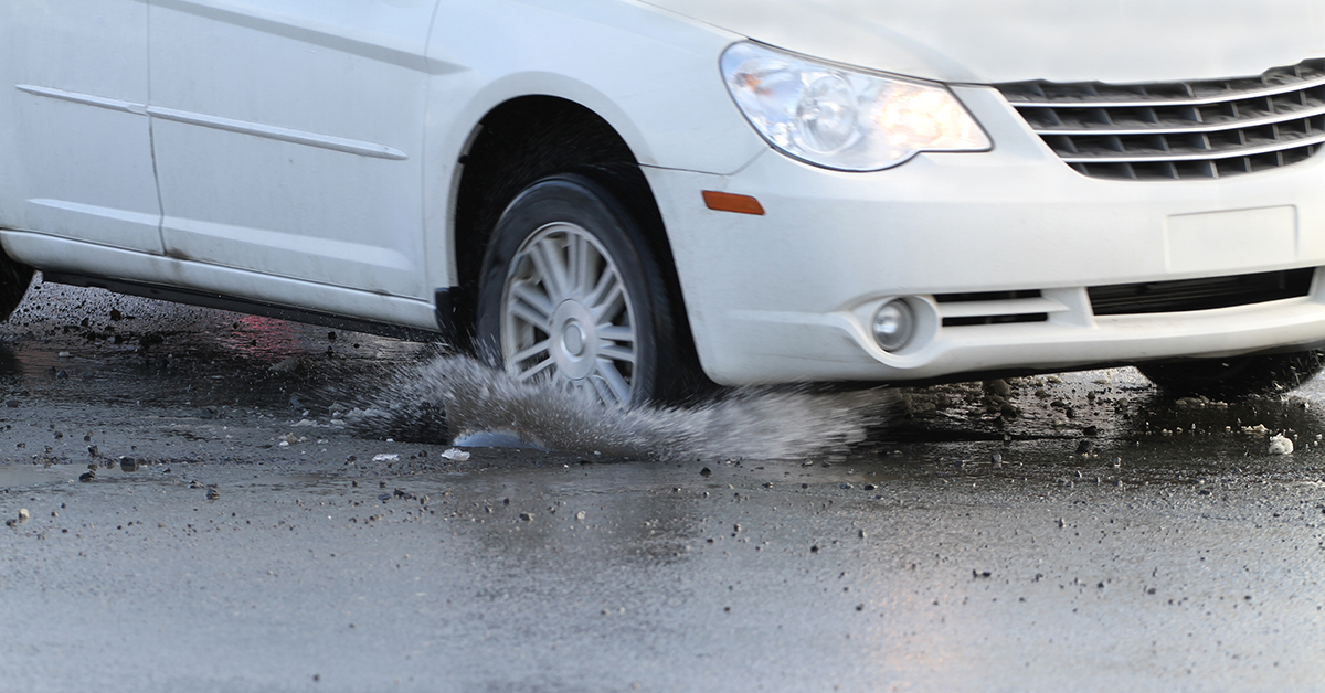 Car hits pothole