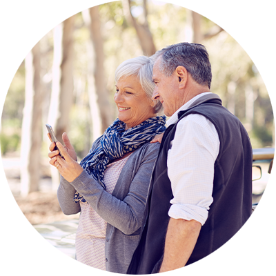 Couple looking at cell phone