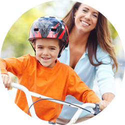 Mom and son riding bicycle